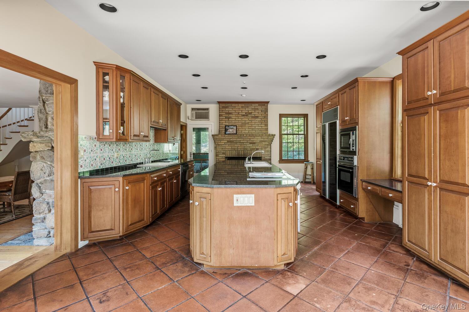 81 Glendale Road Ossining, NY 10562 - Photo 12 of 37 An other view of the kitchen with terracotta tiled flooring