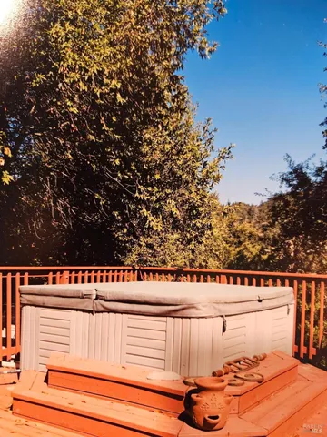 a view of a swimming pool with an outdoor seating