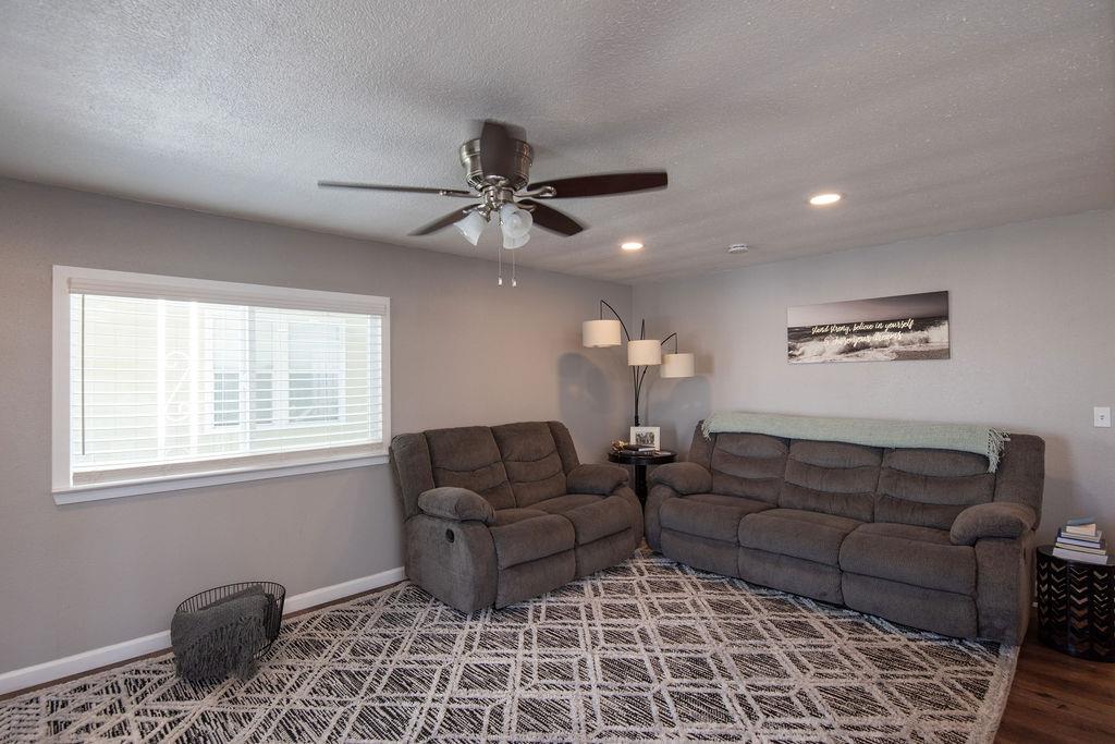 107 Schooner Lane Modesto, CA 95356 - Photo 15 of 43 a living room with furniture and a window