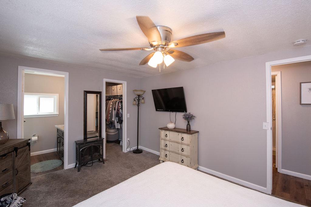 107 Schooner Lane Modesto, CA 95356 - Photo 19 of 43 a living room with furniture and a flat screen tv