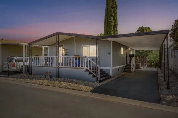 a front view of a house with garage