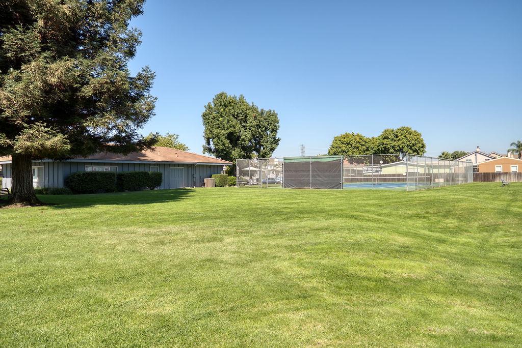 107 Schooner Lane Modesto, CA 95356 - Photo 42 of 43 a front view of a house with garden