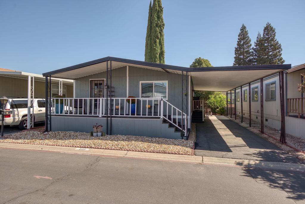 107 Schooner Lane Modesto, CA 95356 - Photo 5 of 43 a view of a house with a balcony