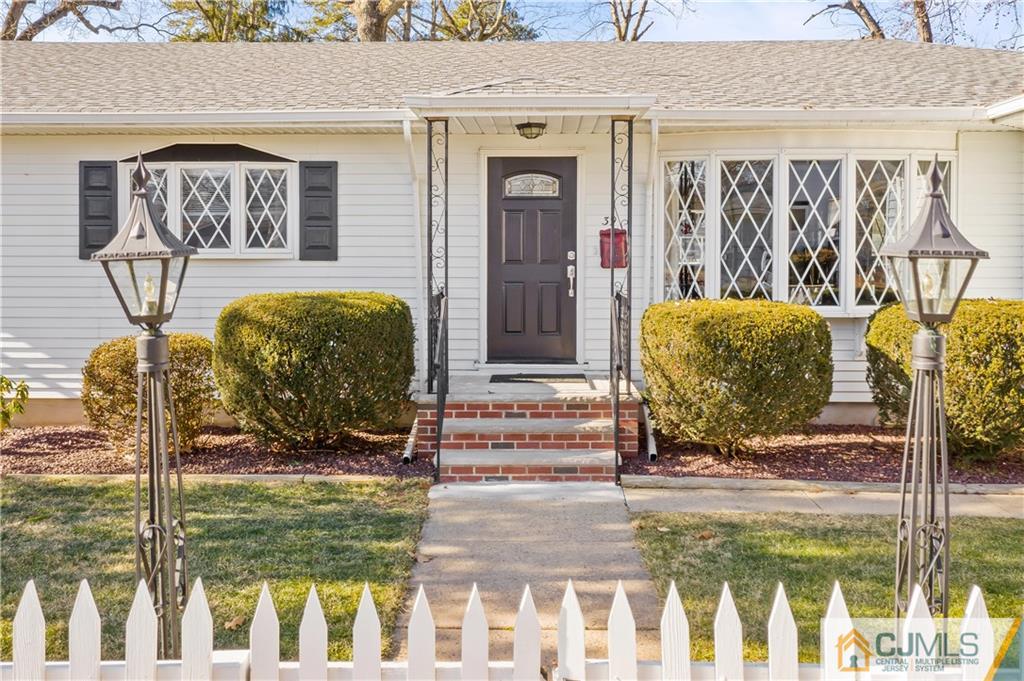 39 Landvale Road Spotswood, NJ 08884 - Photo 2 of 34 a front view of a house with outdoor seating