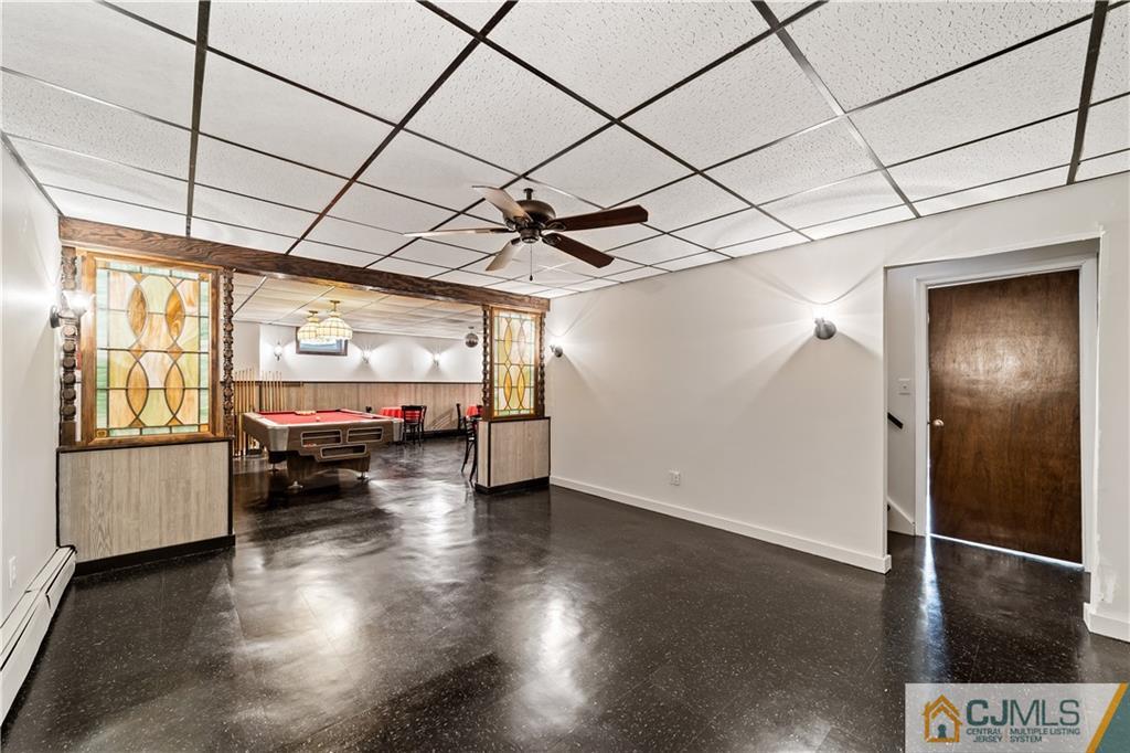 39 Landvale Road Spotswood, NJ 08884 - Photo 23 of 34 a view of a livingroom with furniture wooden floor and window
