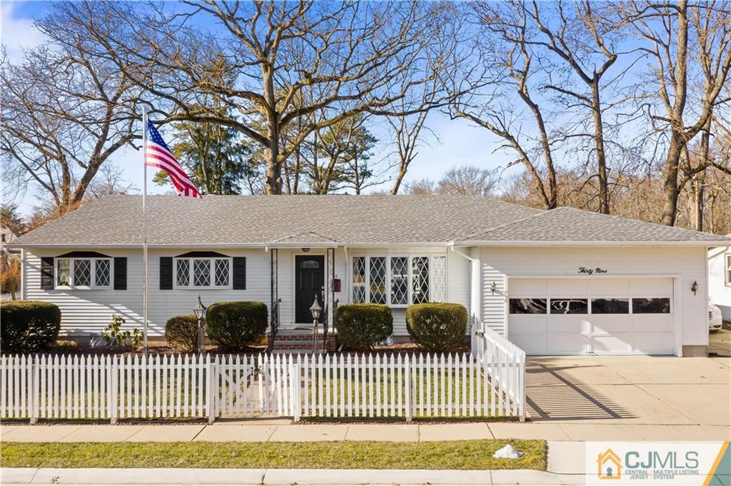 39 Landvale Road Spotswood, NJ 08884 - Photo 3 of 34 front view of a house with a cars
