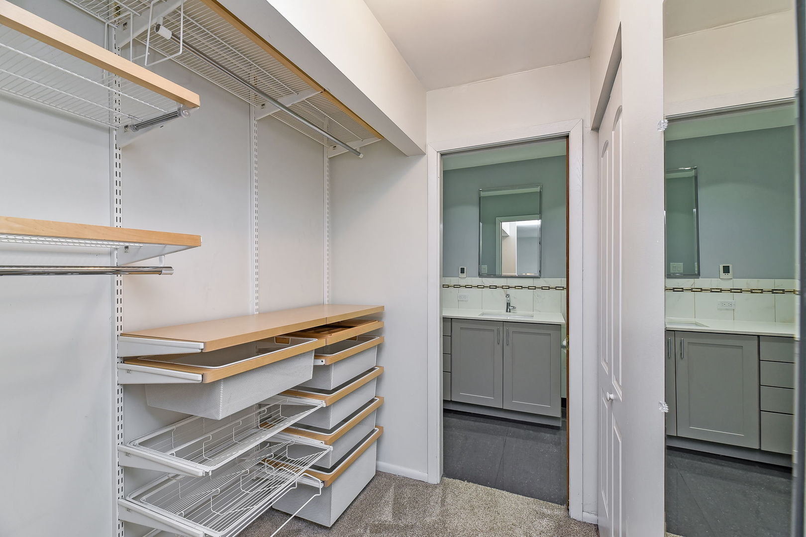 1464 Stonebridge Circle, Unit E3 Wheaton, IL 60189 - Photo 8 of 9 a kitchen with a sink and a refrigerator