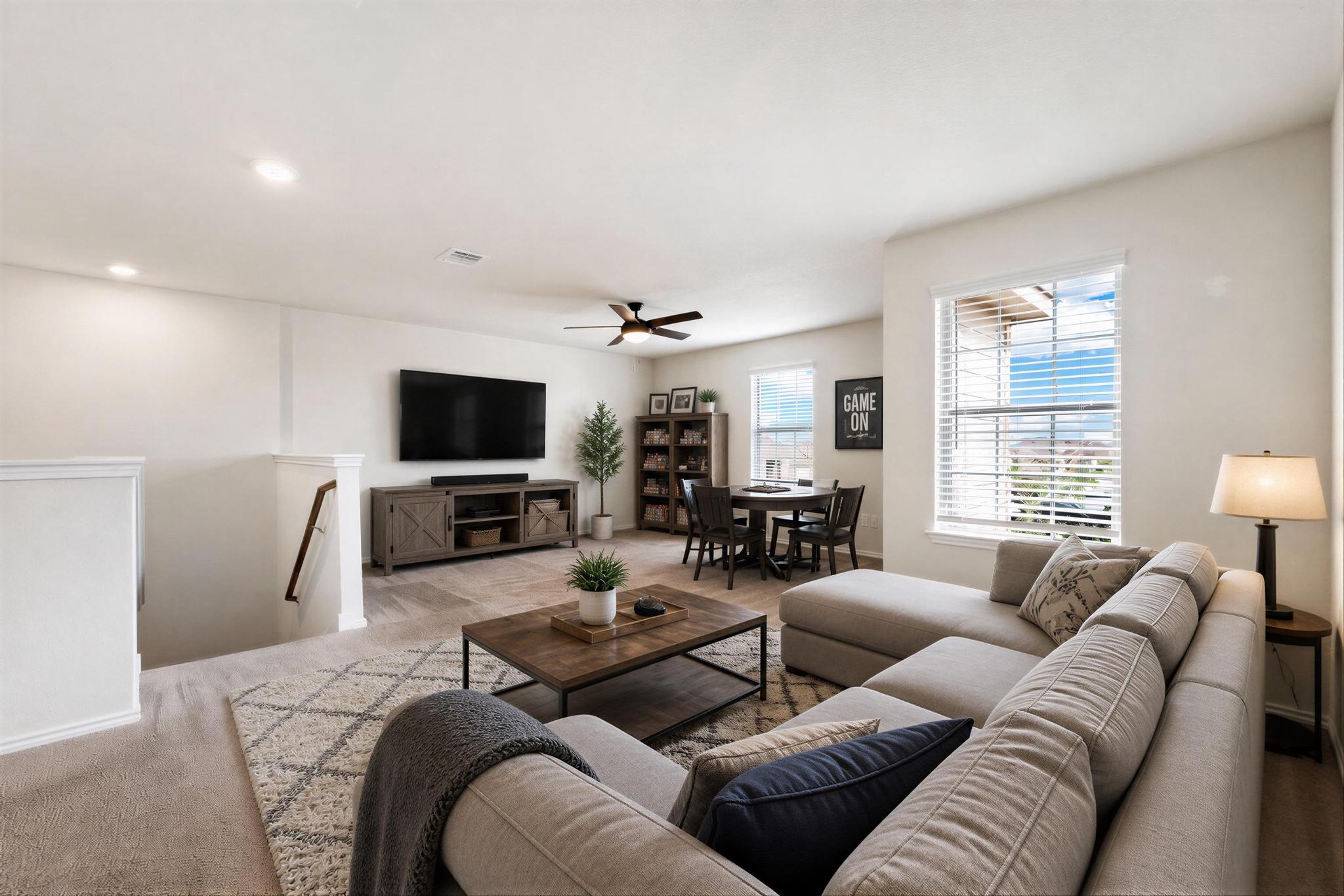 217 Innisfree Road Jarrell, TX 76537 - Photo 20 of 39 An inviting gathering space offers plush seating and ample room for relaxation and entertainment. Virtually Staged