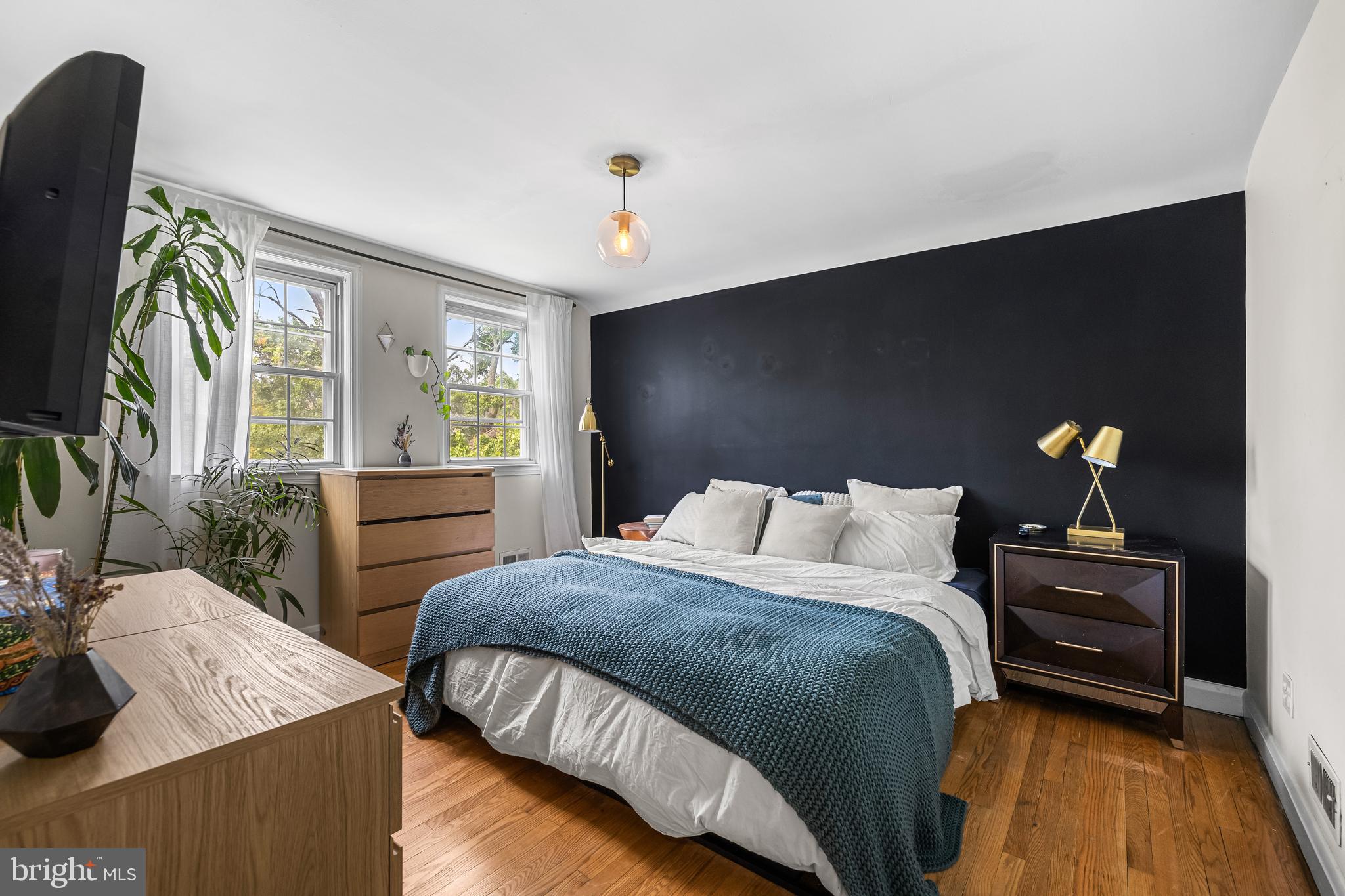 1620 Hardwick Road Towson, MD 21286 - Photo 22 of 38 a bedroom with a bed and a television