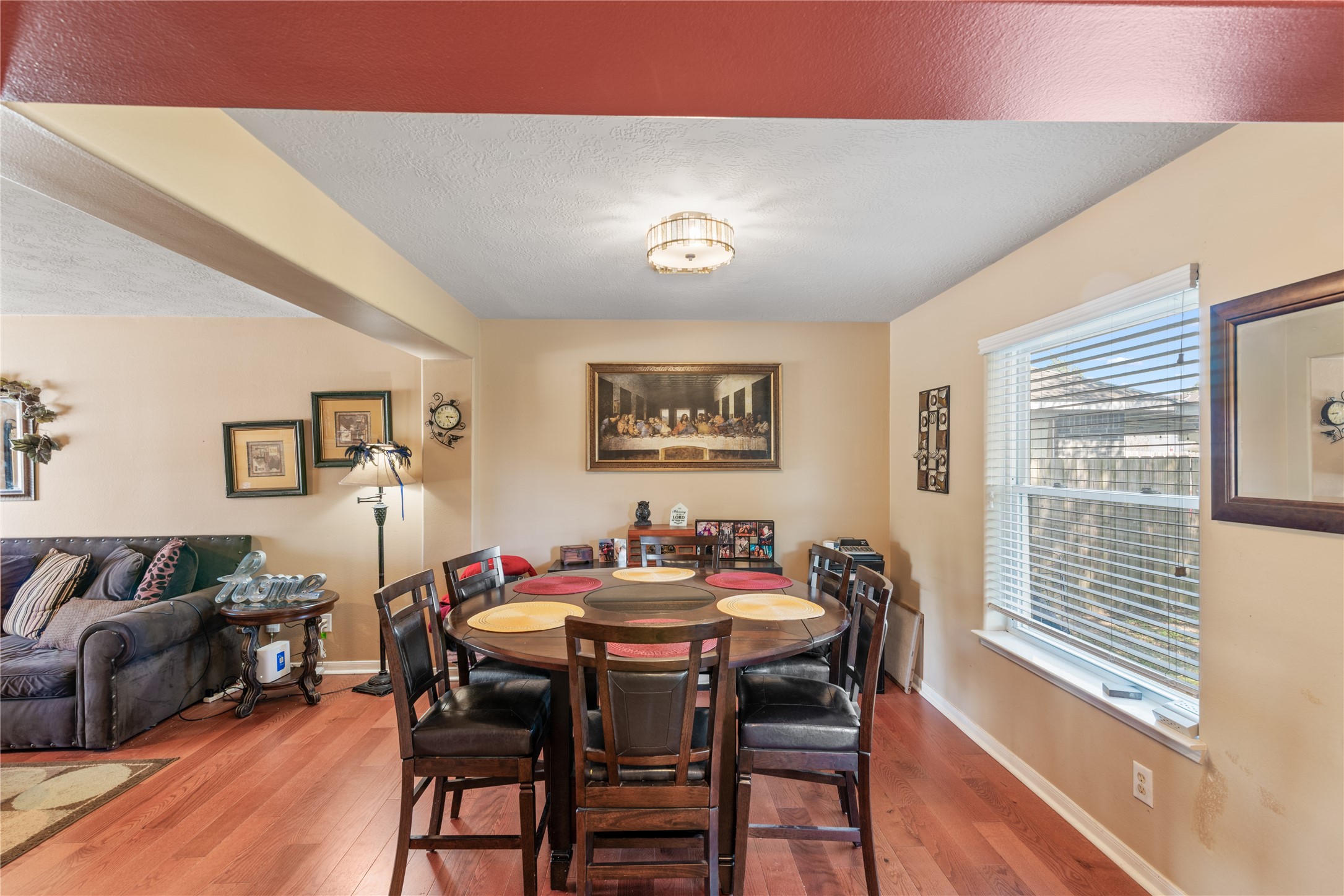 3727 Oaklace Drive Spring, TX 77389 - Photo 11 of 37 a view of a dining room with furniture window and wooden floor