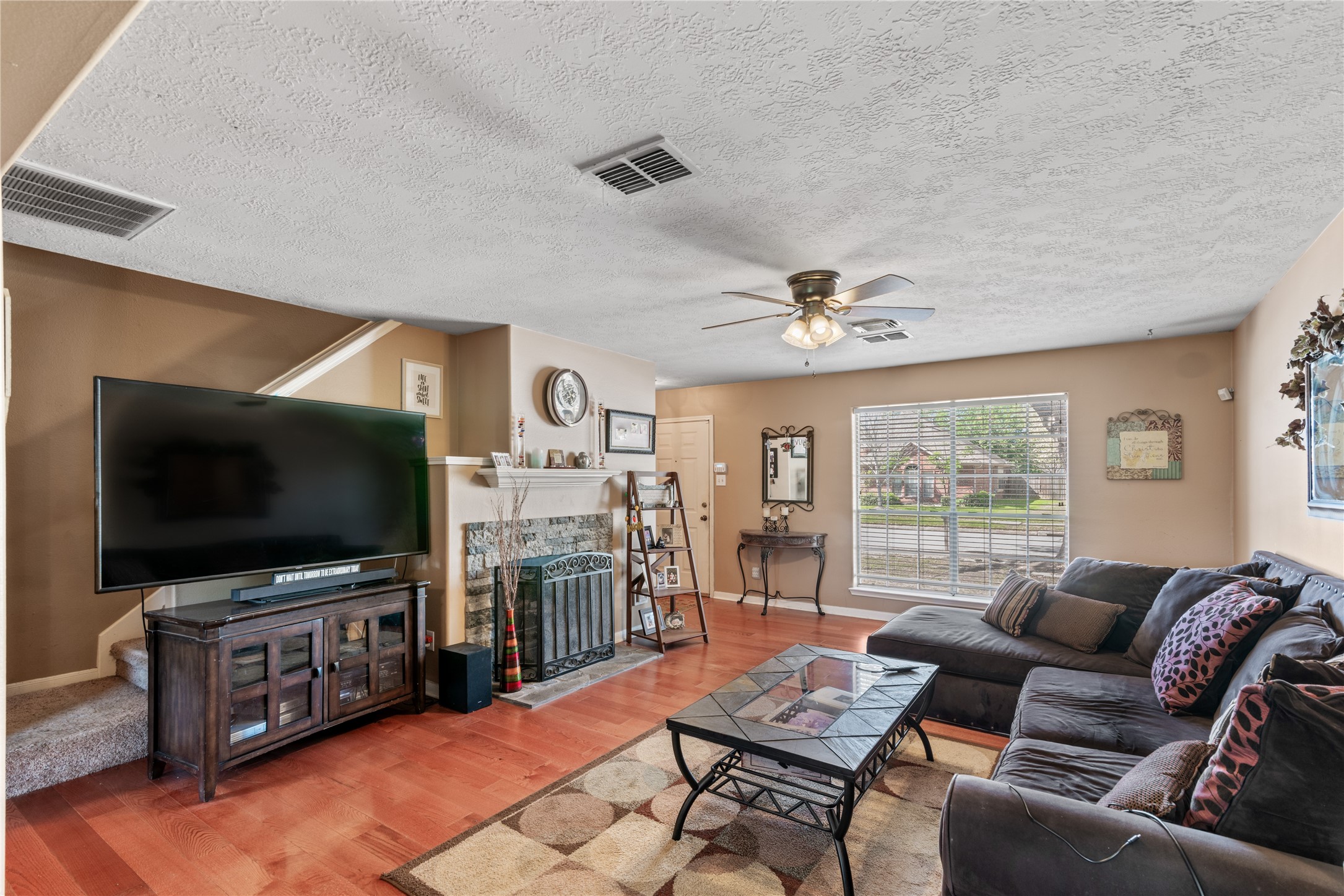 3727 Oaklace Drive Spring, TX 77389 - Photo 12 of 37 a living room with furniture and a flat screen tv