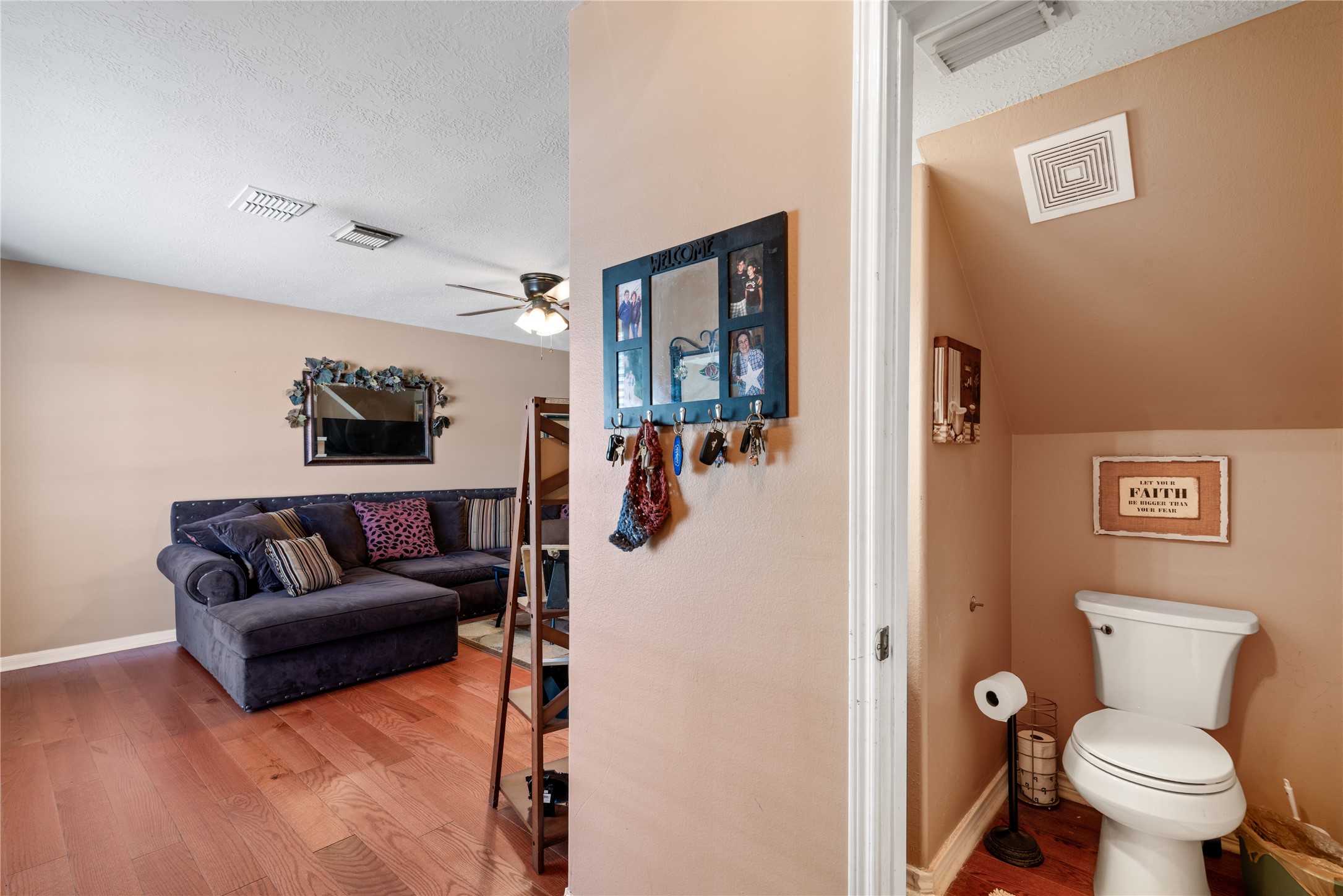 3727 Oaklace Drive Spring, TX 77389 - Photo 14 of 37 a living room with furniture and a toilet