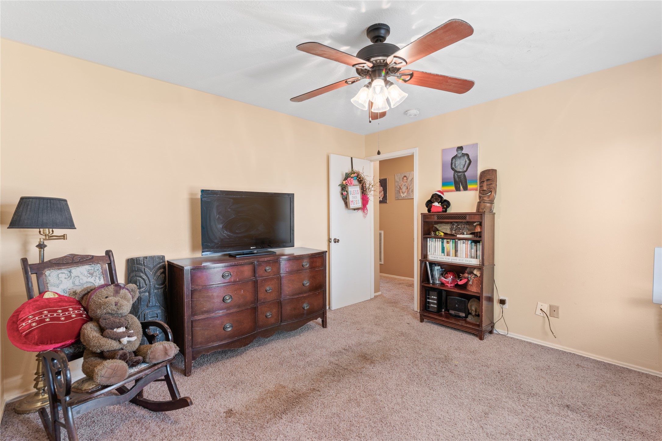 3727 Oaklace Drive Spring, TX 77389 - Photo 22 of 37 a living room with furniture and a flat screen tv