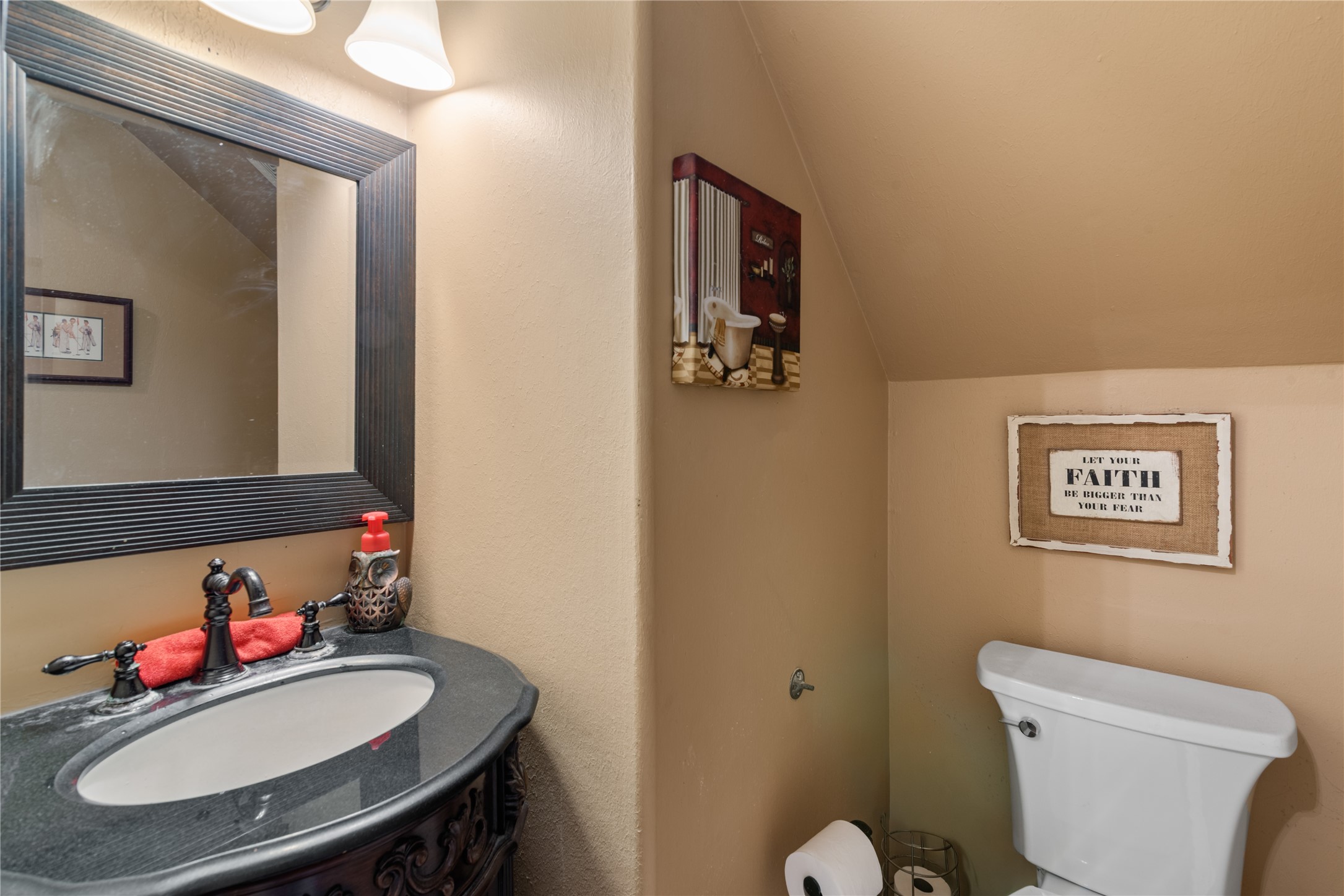 3727 Oaklace Drive Spring, TX 77389 - Photo 26 of 37 a bathroom with a toilet a sink and a mirror