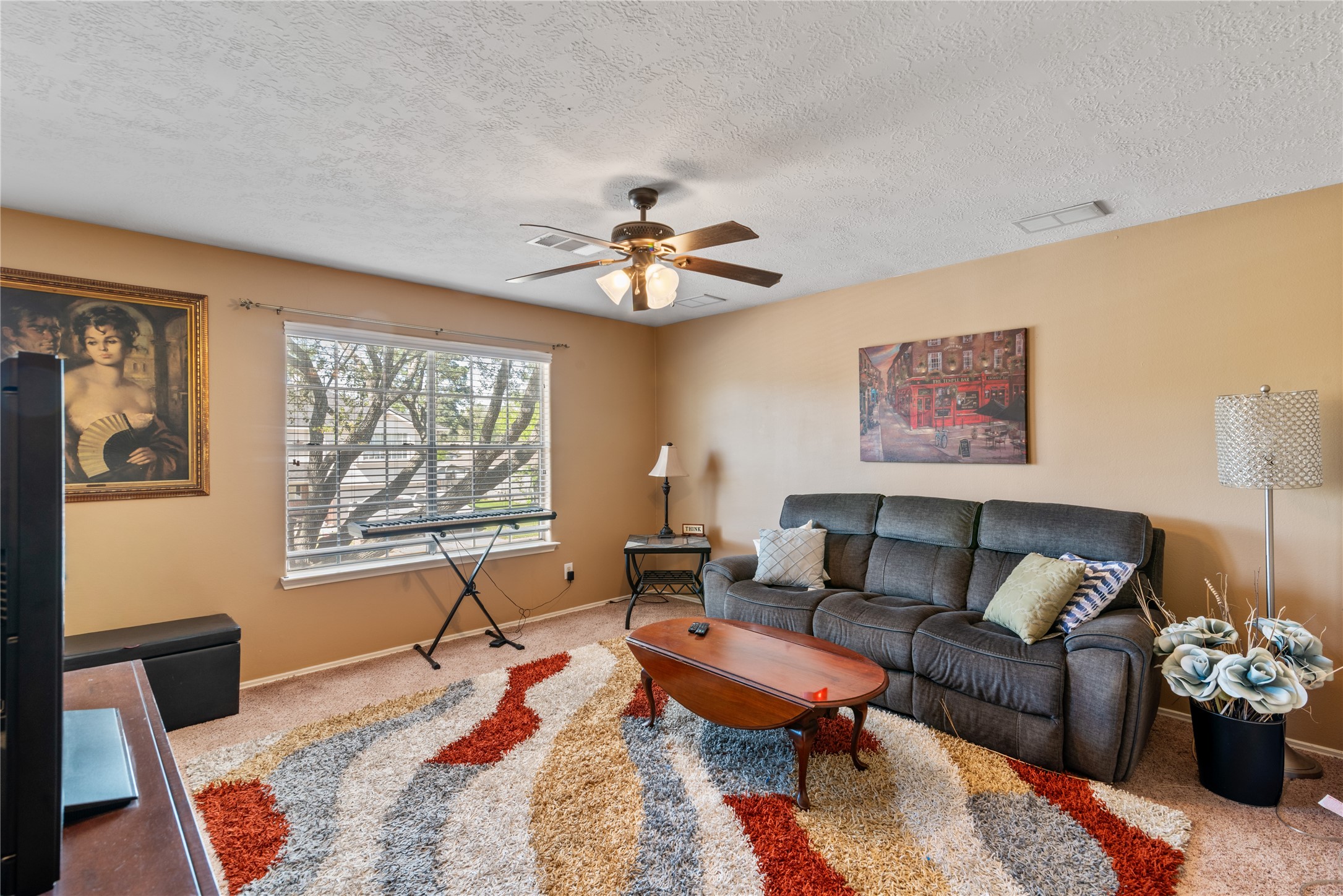 3727 Oaklace Drive Spring, TX 77389 - Photo 28 of 37 a living room with furniture a table and a window