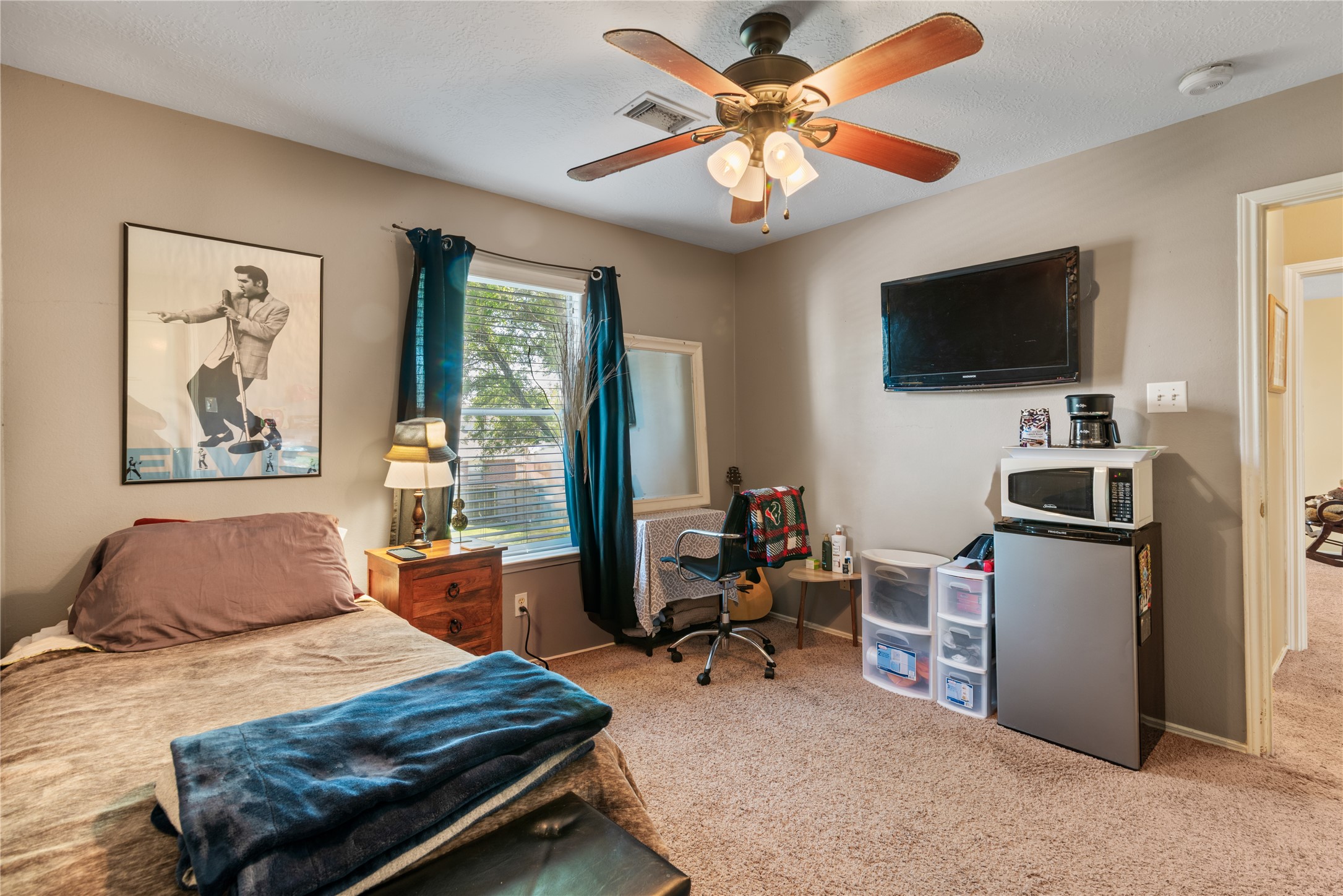 3727 Oaklace Drive Spring, TX 77389 - Photo 30 of 37 a bedroom with furniture and a flat screen tv