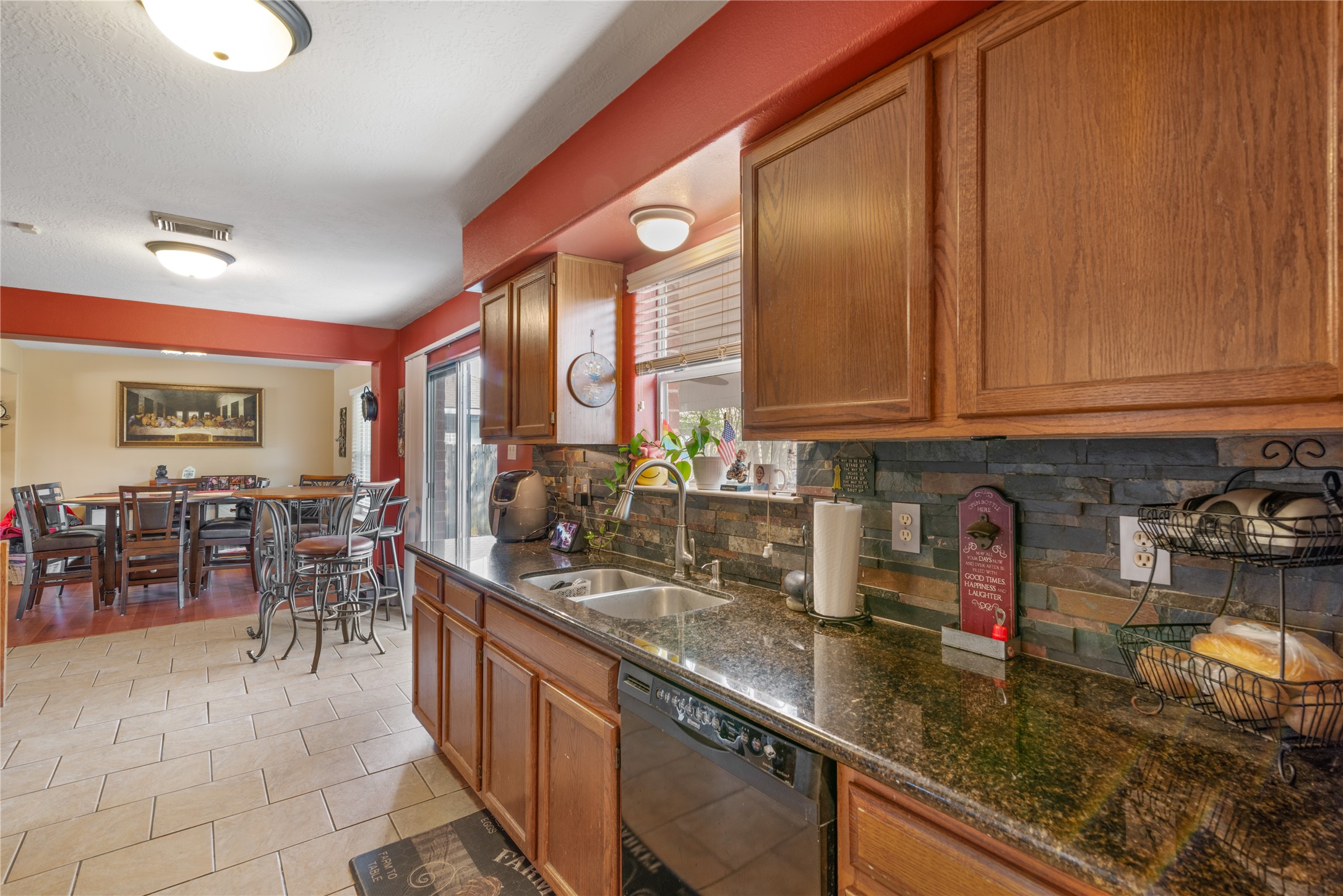 3727 Oaklace Drive Spring, TX 77389 - Photo 9 of 37 a kitchen with stainless steel appliances granite countertop sink stove and cabinets