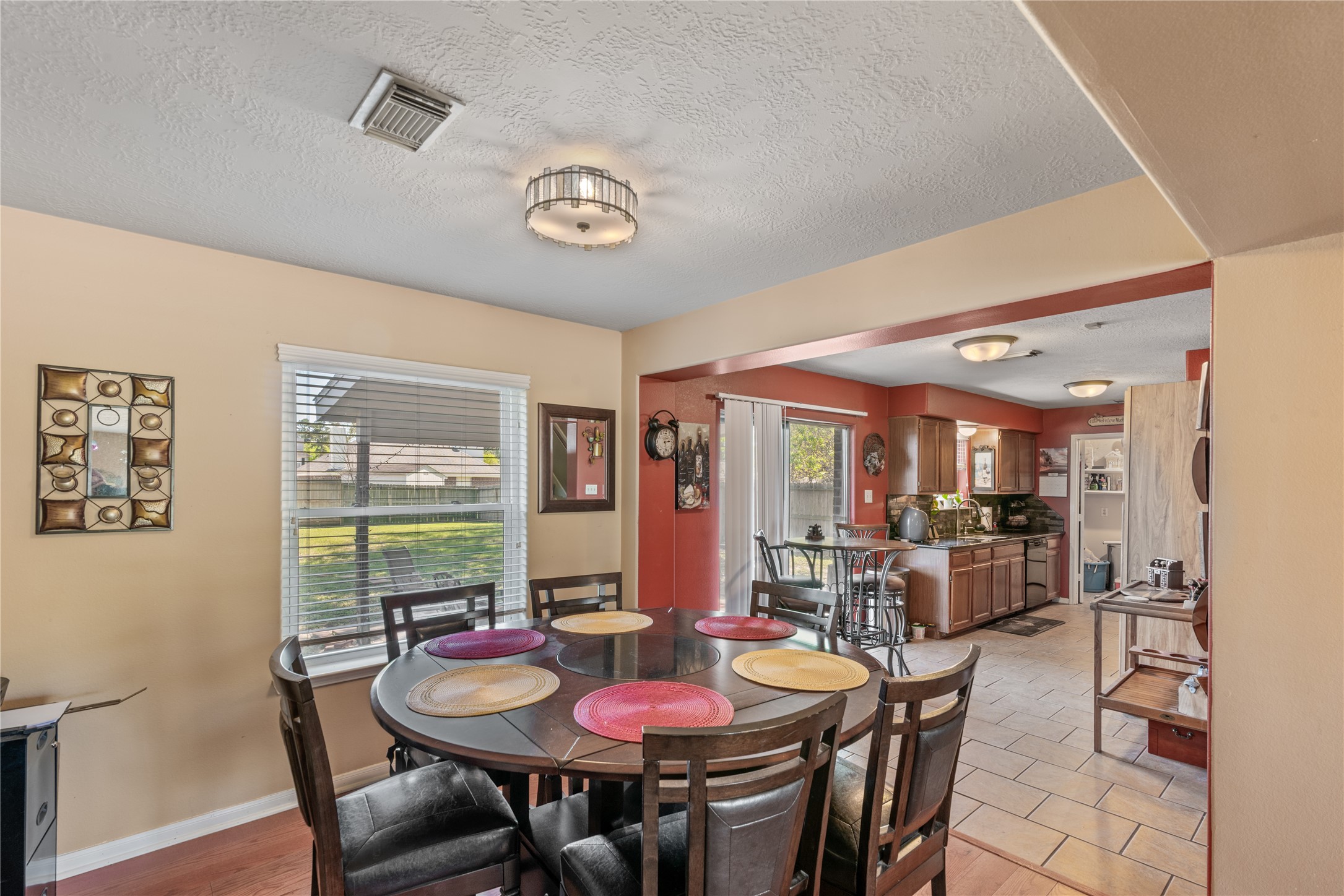 3727 Oaklace Drive Spring, TX 77389 - Photo 10 of 37 a view of a dining room with furniture window and outside view