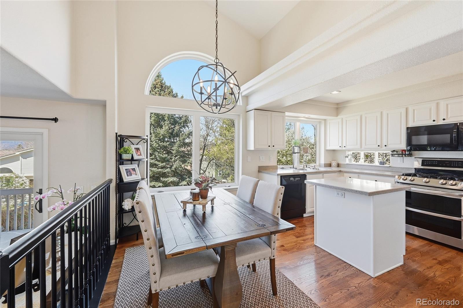 9153 Roadrunner Drive Highlands Ranch, CO 80129 - Photo 11 of 39 a view of dining table and chairs