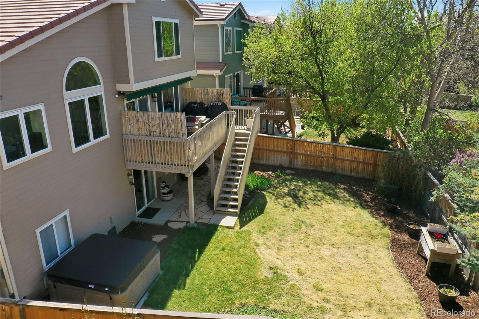 9153 Roadrunner Drive Highlands Ranch, CO 80129 - Photo 37 of 39 a view of outdoor space yard and deck