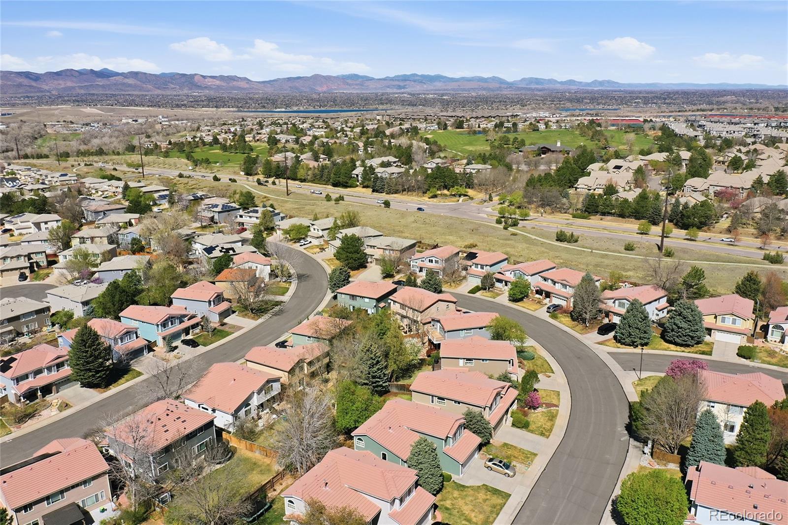 9153 Roadrunner Drive Highlands Ranch, CO 80129 - Photo 39 of 39 an aerial view of residential house with outdoor space and mountain view