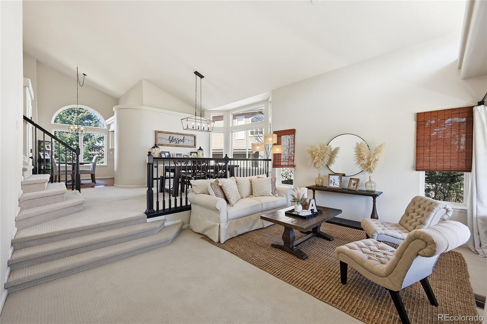 9153 Roadrunner Drive Highlands Ranch, CO 80129 - Photo 5 of 39 a living room with furniture and wooden floor