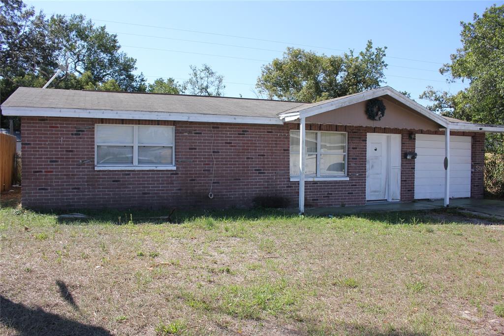 7706 Coventry Drive Port Richey, FL 34668 - Photo 1 of 1 a view of a backyard