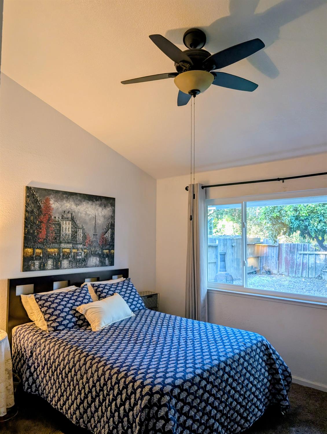 5637 Chris Ann Court Sacramento, CA 95841 - Photo 11 of 23 a bedroom with a bed and a painting on the wall