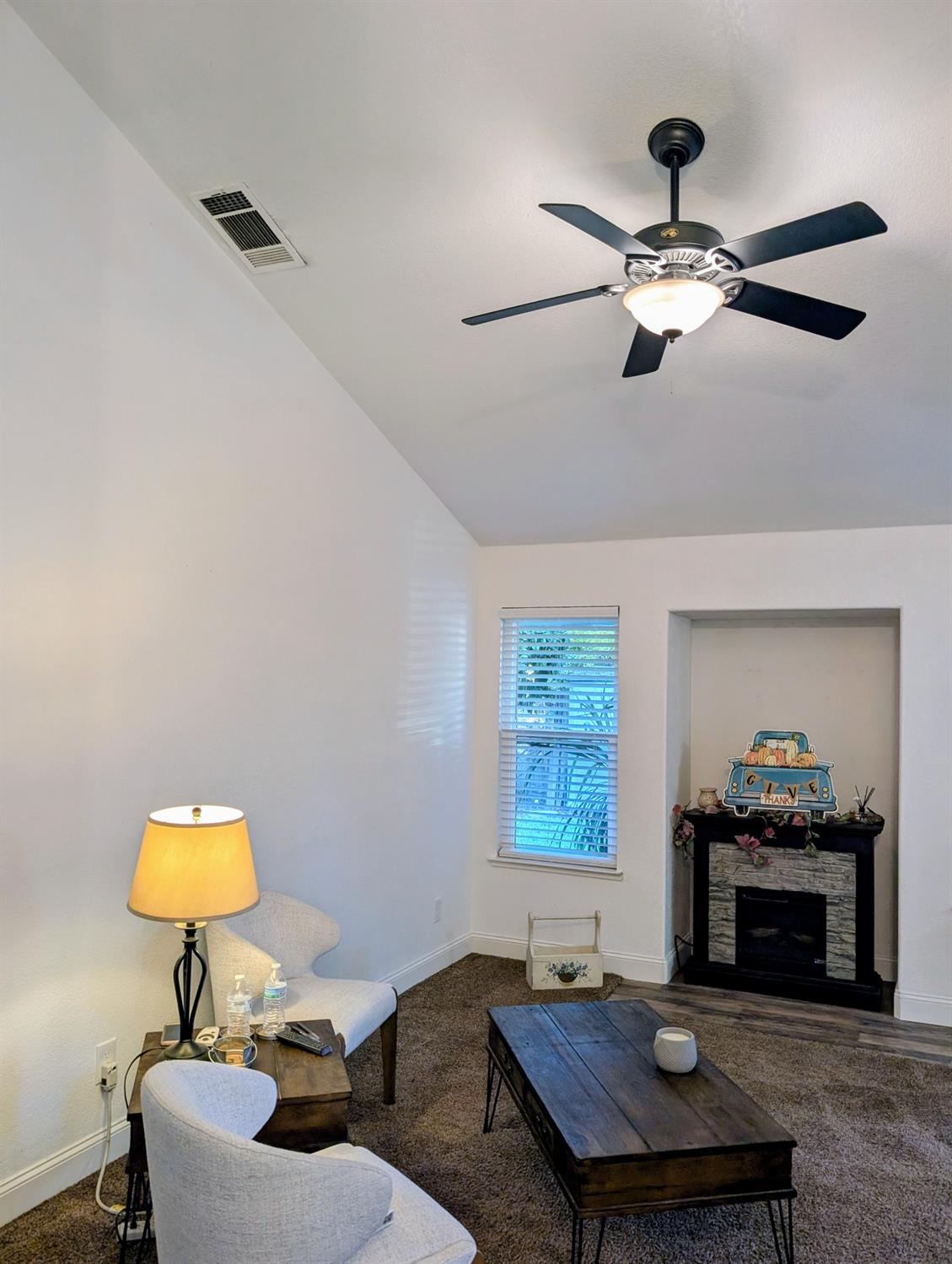 5637 Chris Ann Court Sacramento, CA 95841 - Photo 14 of 23 a living room with furniture and a fireplace