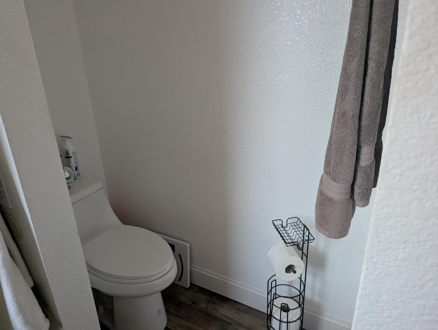 5637 Chris Ann Court Sacramento, CA 95841 - Photo 16 of 23 a white toilet sitting next to a sink