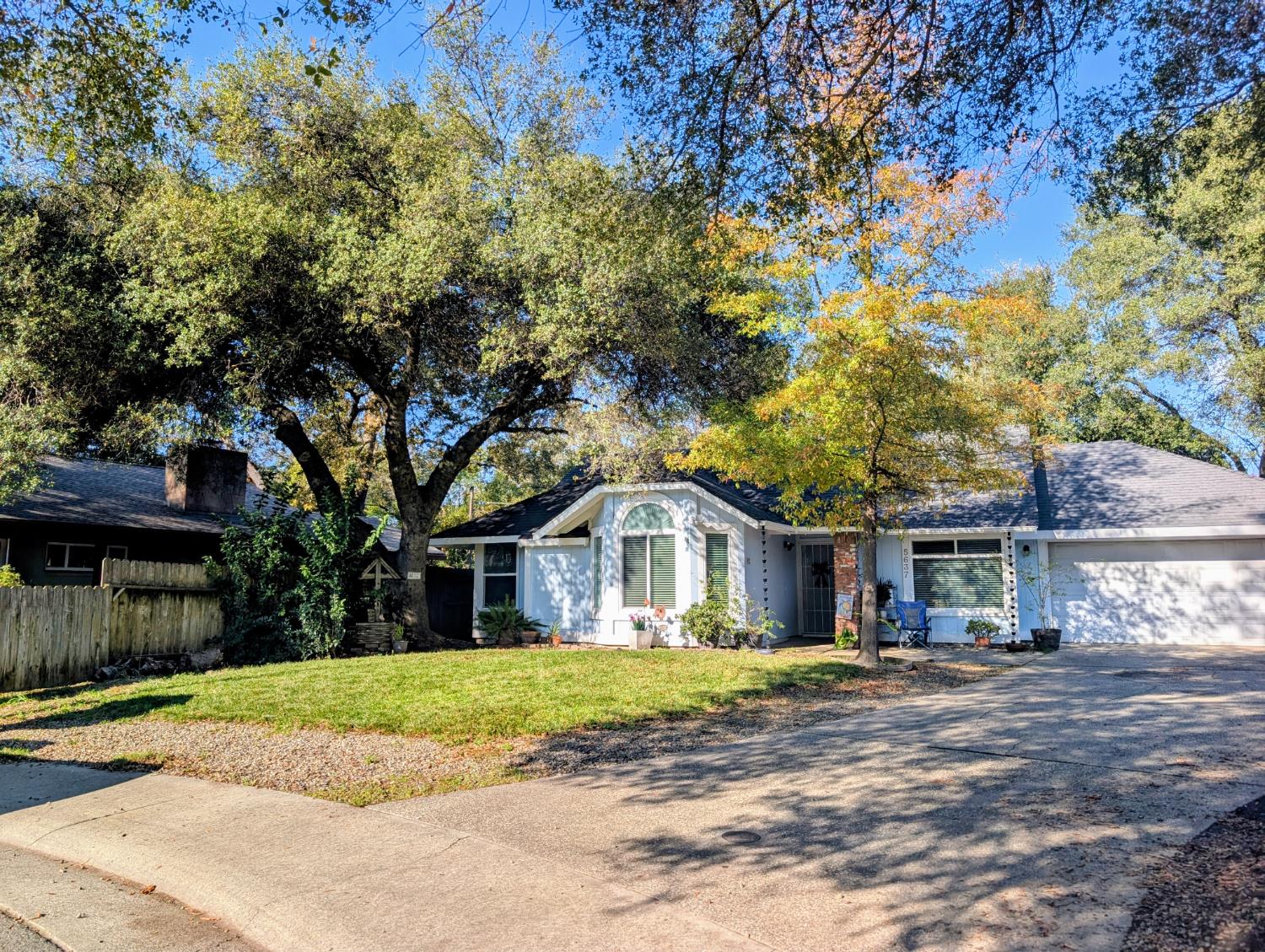5637 Chris Ann Court Sacramento, CA 95841 - Photo 2 of 23 a front view of a house with a yard