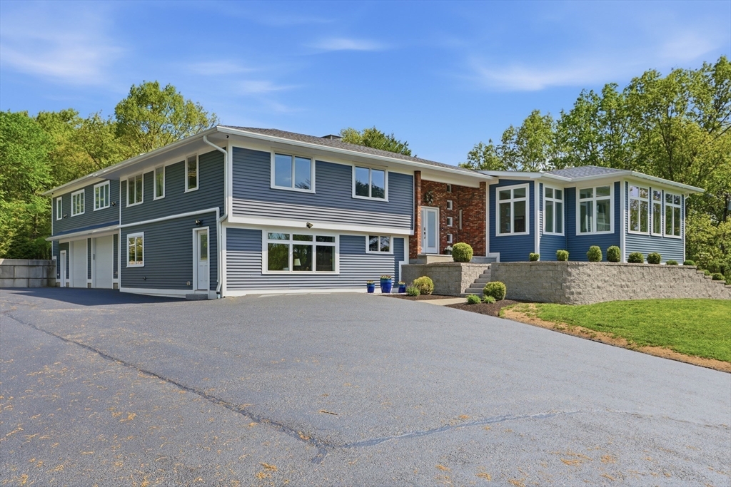 235 Kemp Street Dunstable, MA 01827 - Photo 41 of 42 front view of a house with a yard