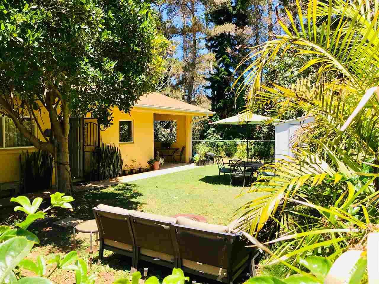 447 Ainakula Road, Unit 9A Kula, HI 96790 - Photo 3 of 27 a view of a house with a yard