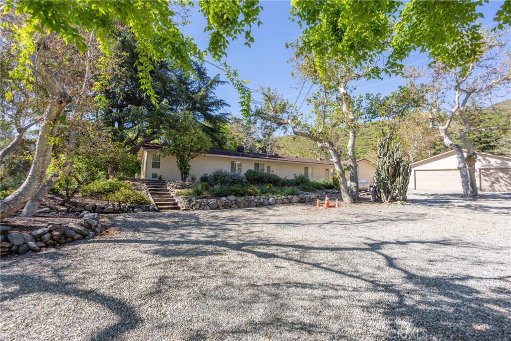 3192 Lytle Creek Road Lytle Creek, CA 92358 - Photo 43 of 63 Rear of property and detached 3 car garage view