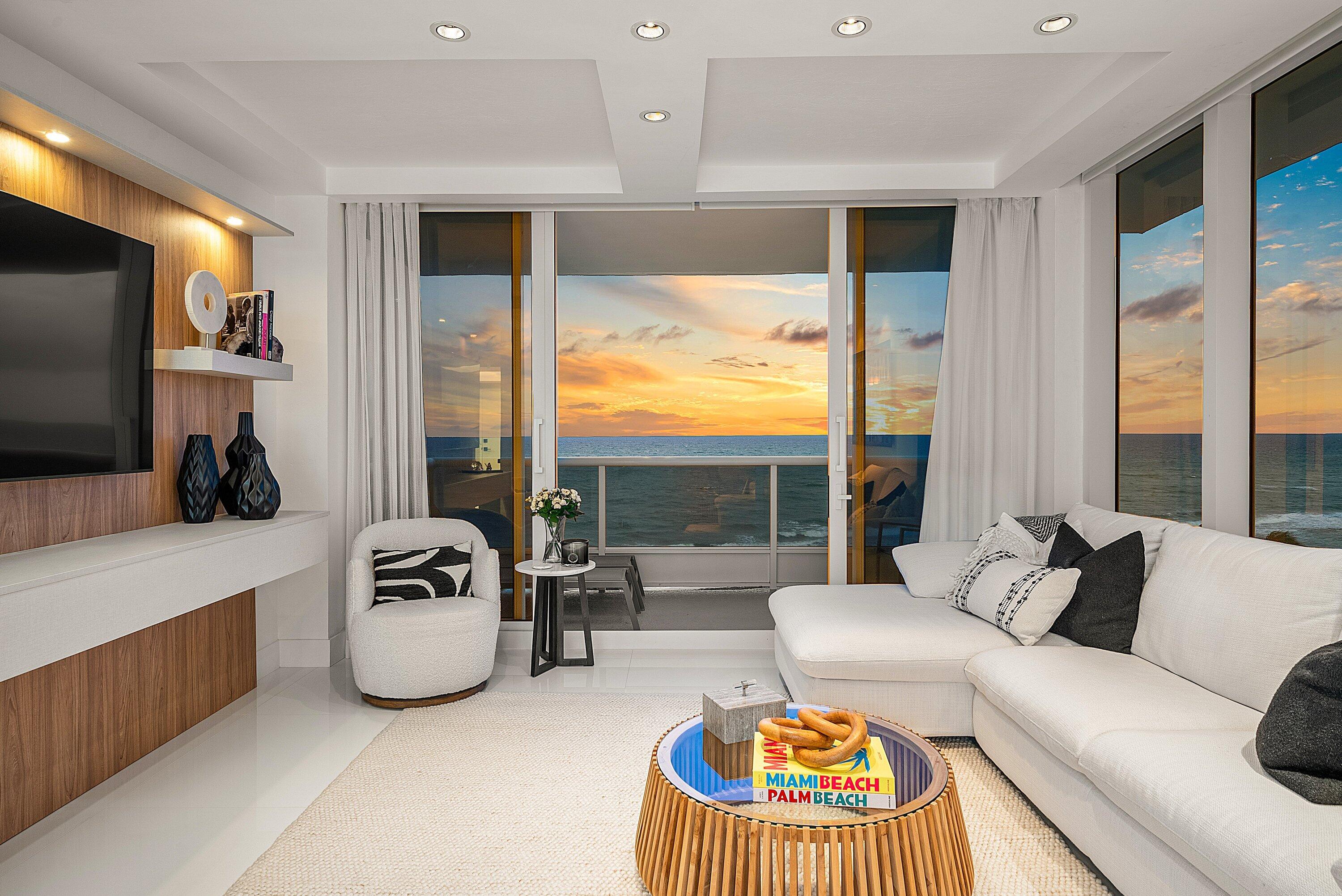 700 South Ocean Boulevard, Unit 705 Boca Raton, FL 33432 - Photo 14 of 58 a living room with furniture and a flat screen tv