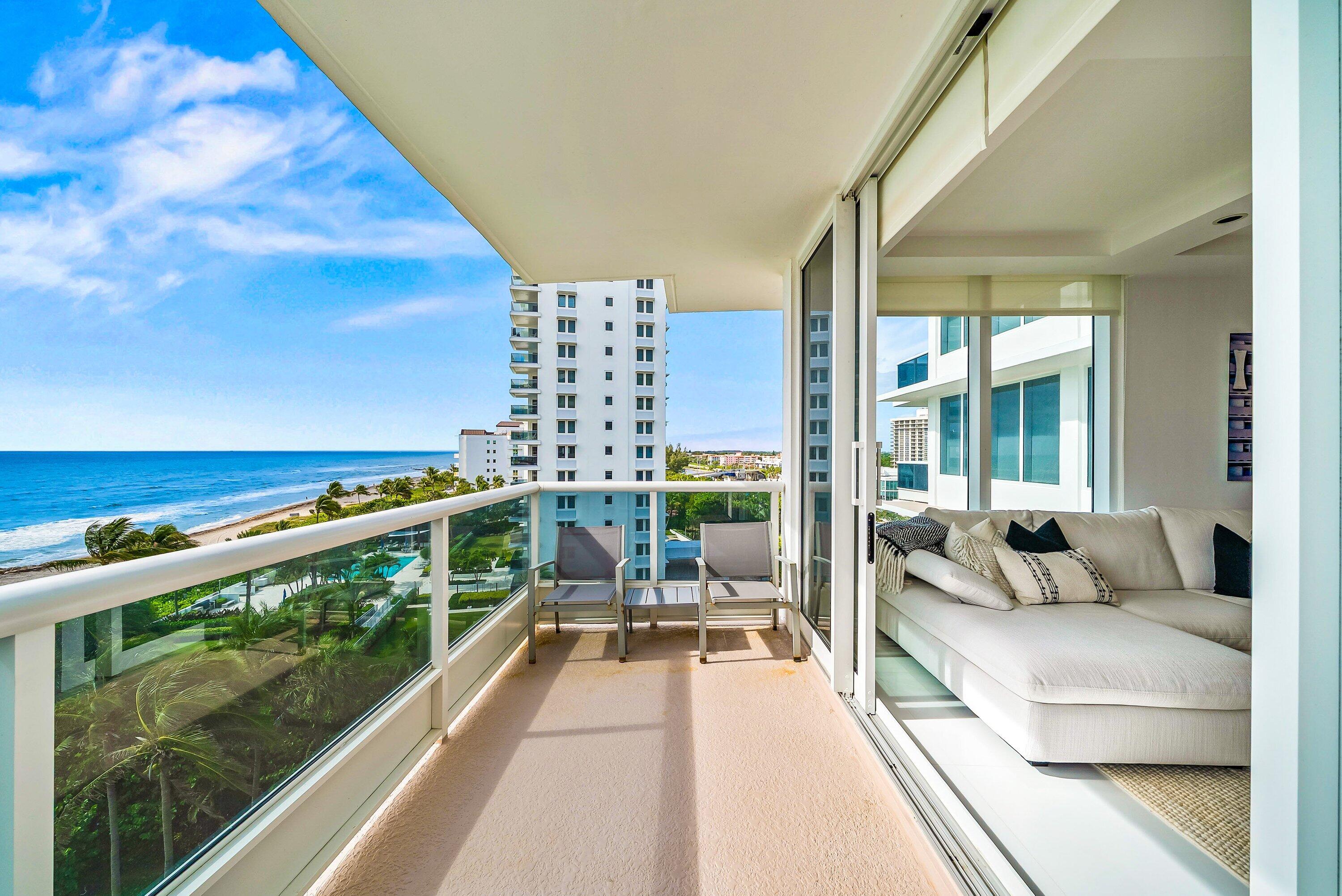 700 South Ocean Boulevard, Unit 705 Boca Raton, FL 33432 - Photo 15 of 58 a balcony with furniture and city view