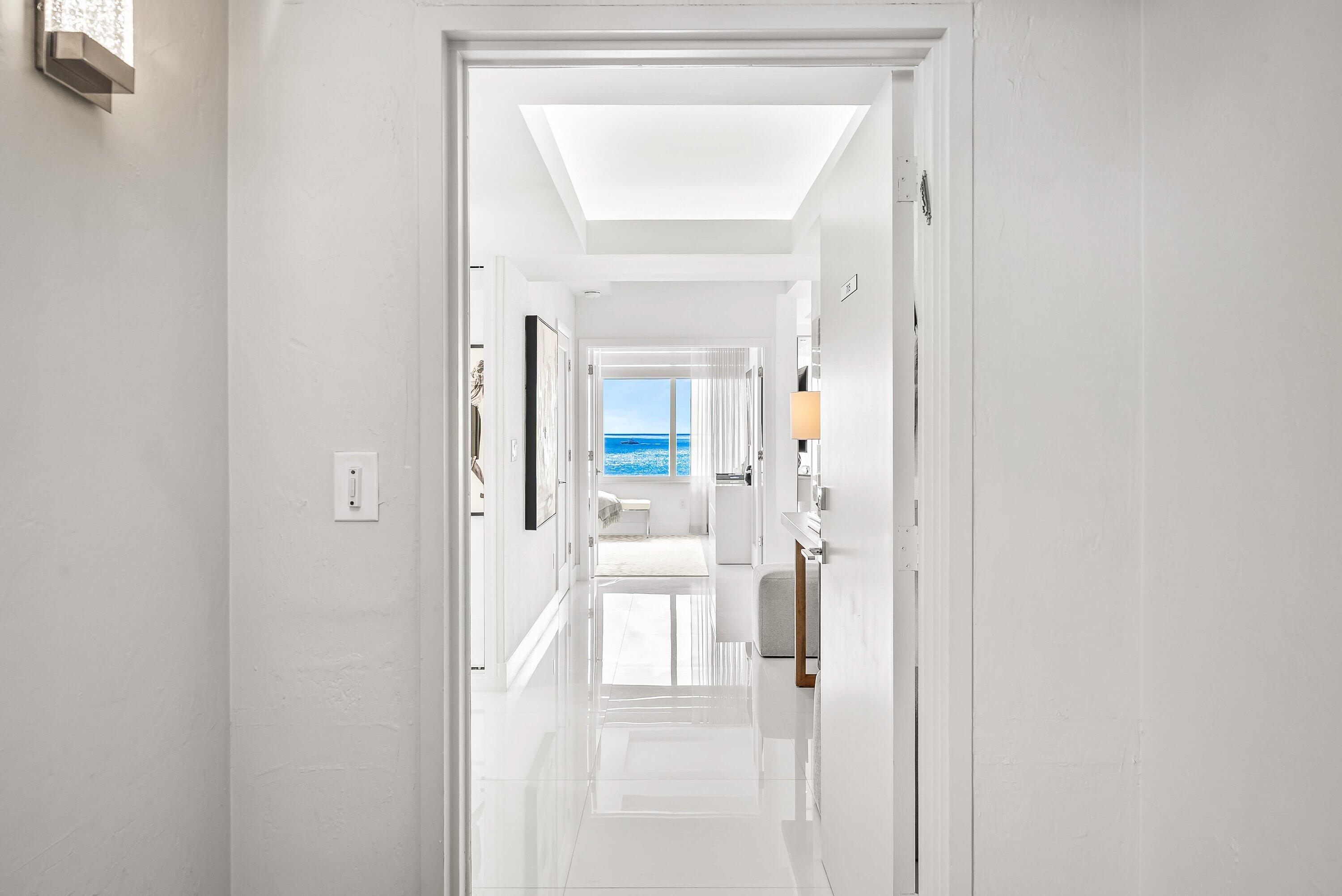 700 South Ocean Boulevard, Unit 705 Boca Raton, FL 33432 - Photo 22 of 58 a view of a bathroom from a hallway