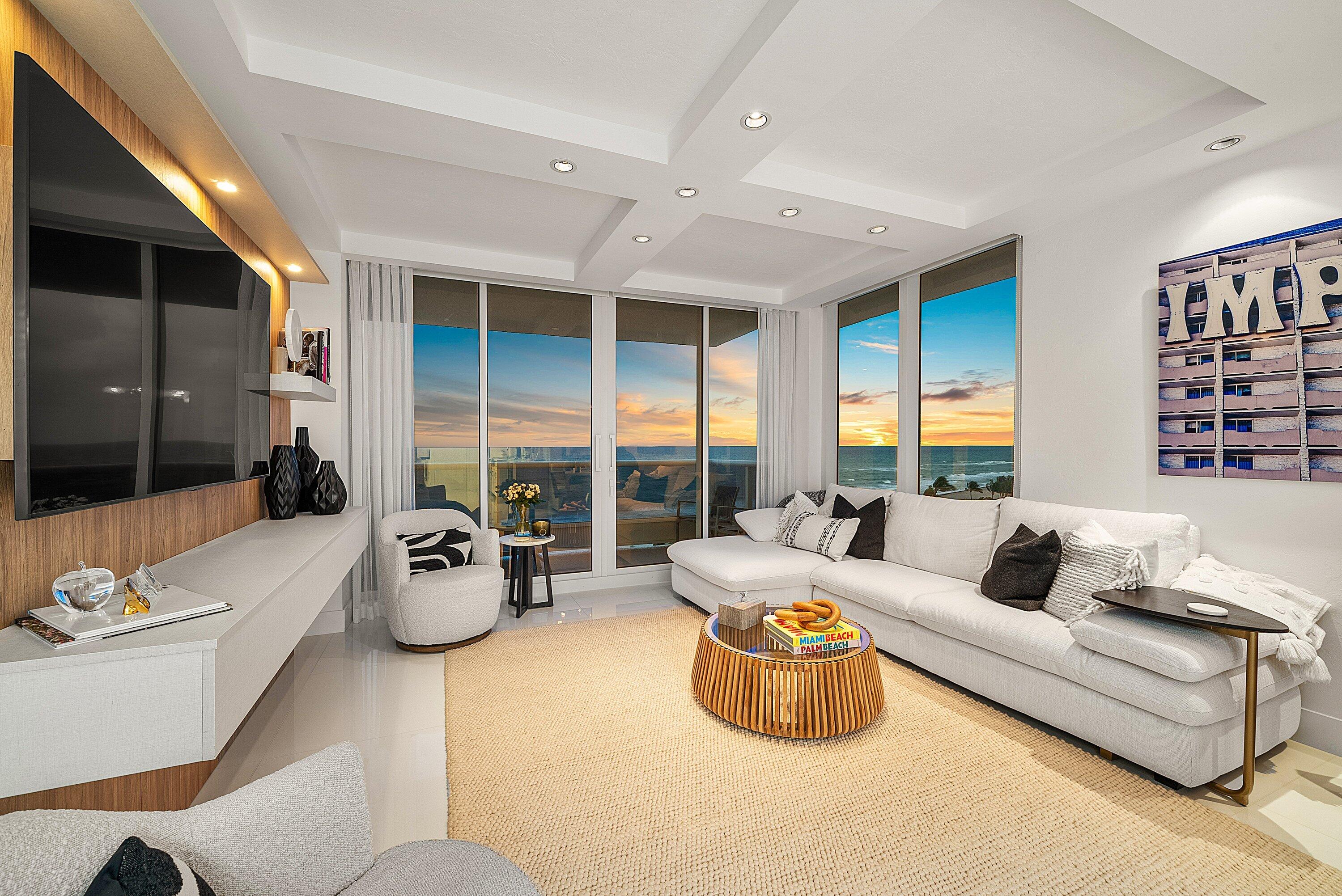 700 South Ocean Boulevard, Unit 705 Boca Raton, FL 33432 - Photo 10 of 58 a living room with furniture and a large window