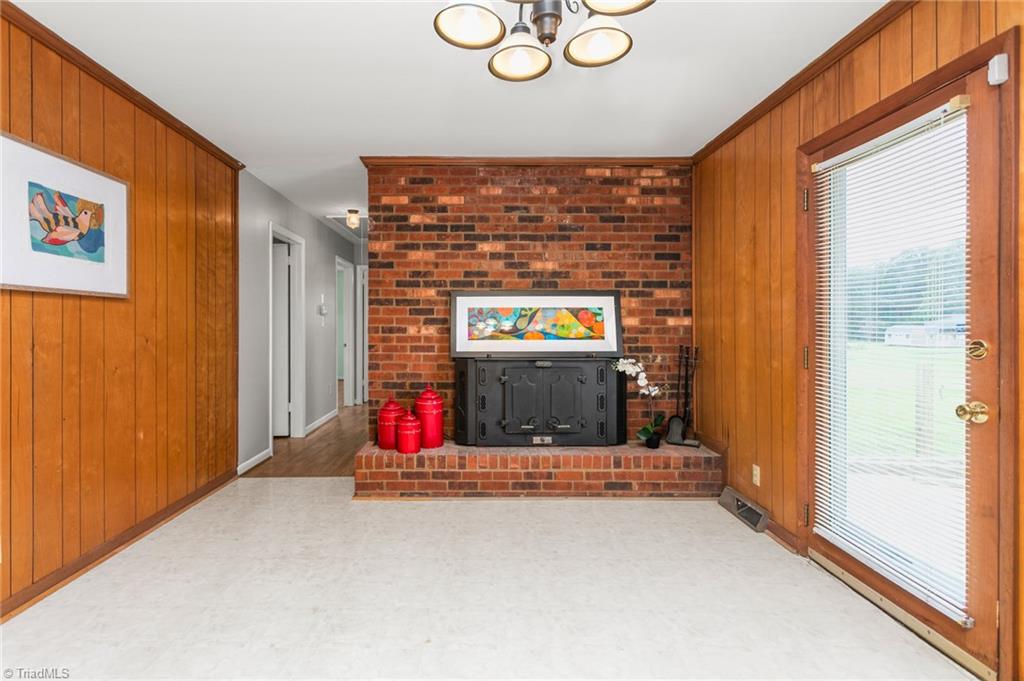 3949 Lewiston Road Summerfield, NC 27358 - Photo 7 of 34 Dining/Den (fireplace has not been used by seller)