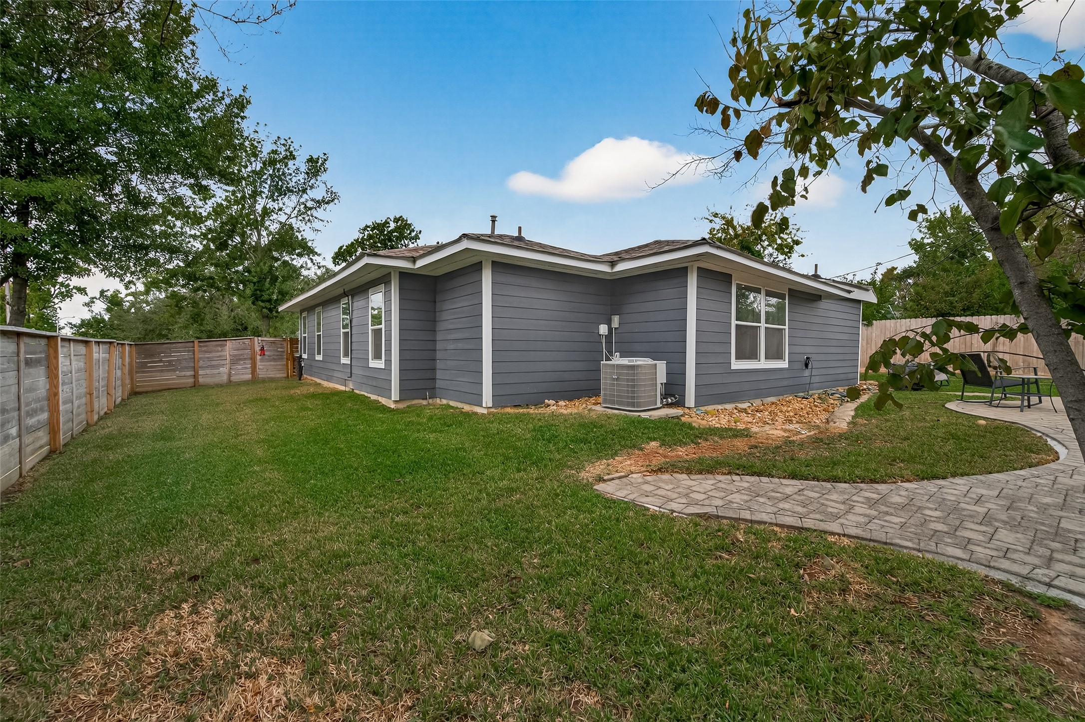802 Nashua Street Houston, TX 77008 - Photo 16 of 16 a view of a house with a yard