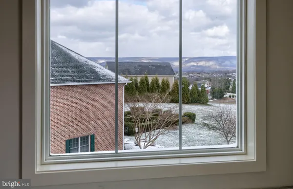 a view of a glass door and a window