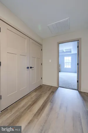 a view of an empty room and window