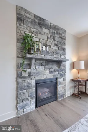 a living room with a fireplace