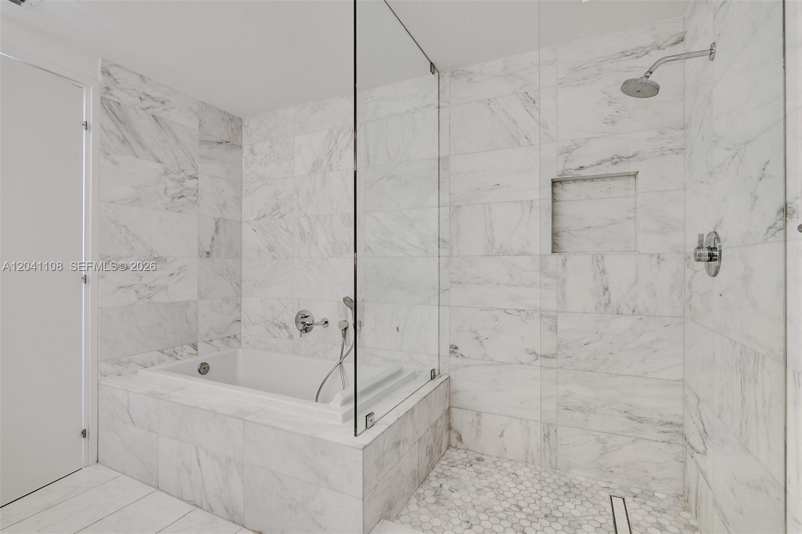401 North Birch Road, Unit 715 Fort Lauderdale, FL 33304 - Photo 10 of 48 Marble shower and separate tub
