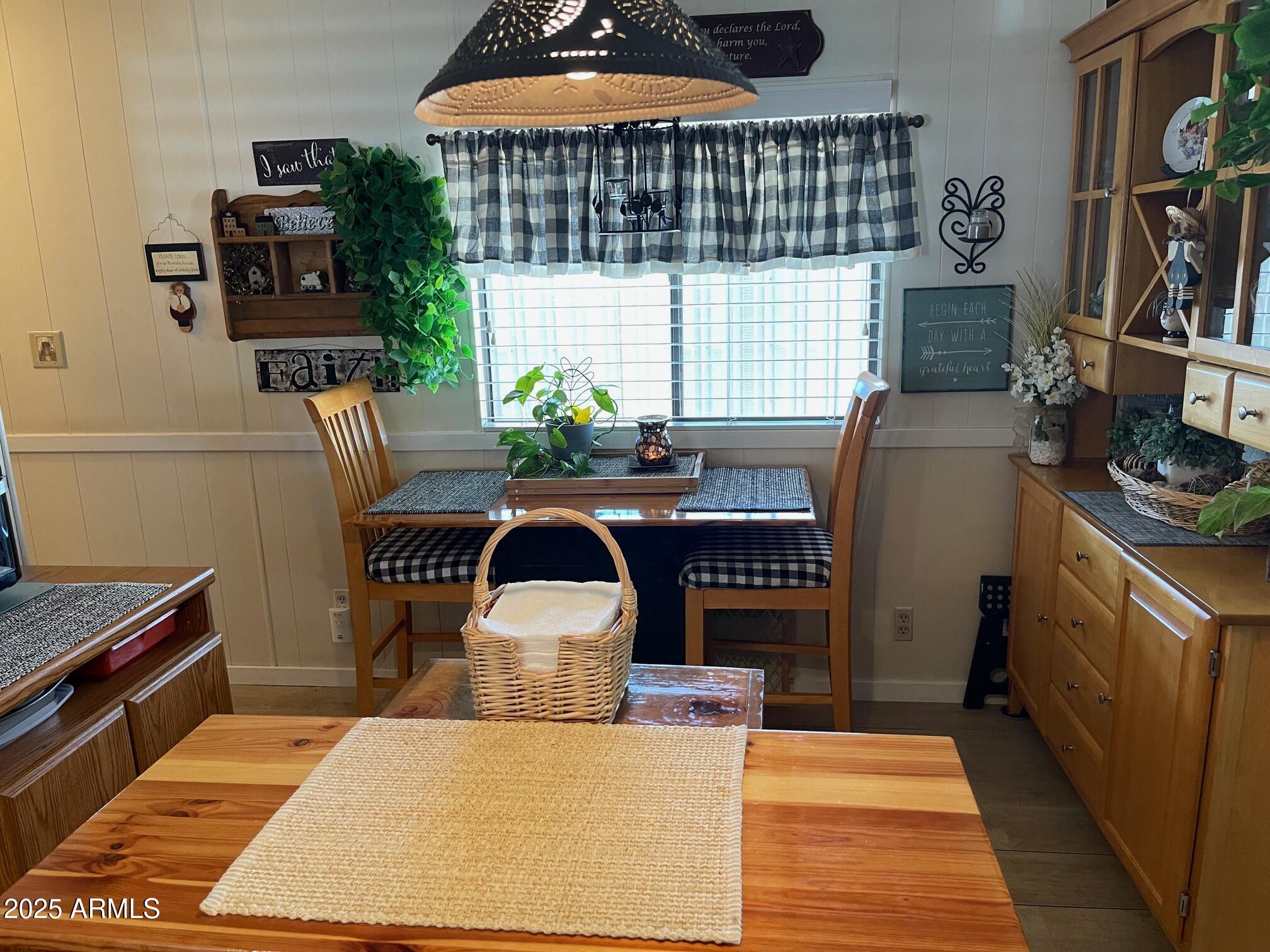 980 East Broadway Avenue, Unit 15 Apache Junction, AZ 85119 - Photo 12 of 24 a dining room with furniture and window