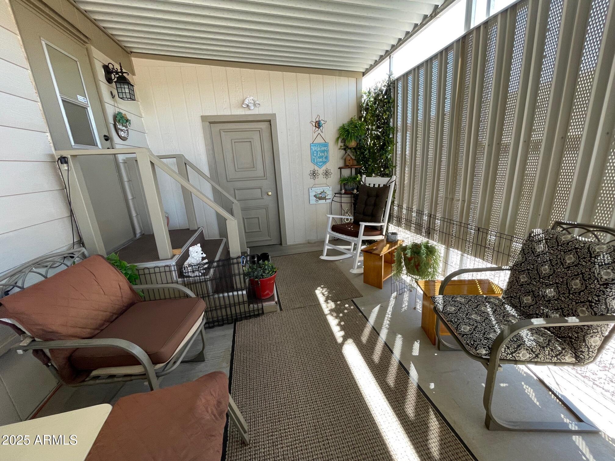 980 East Broadway Avenue, Unit 15 Apache Junction, AZ 85119 - Photo 20 of 24 a view of balcony with furniture