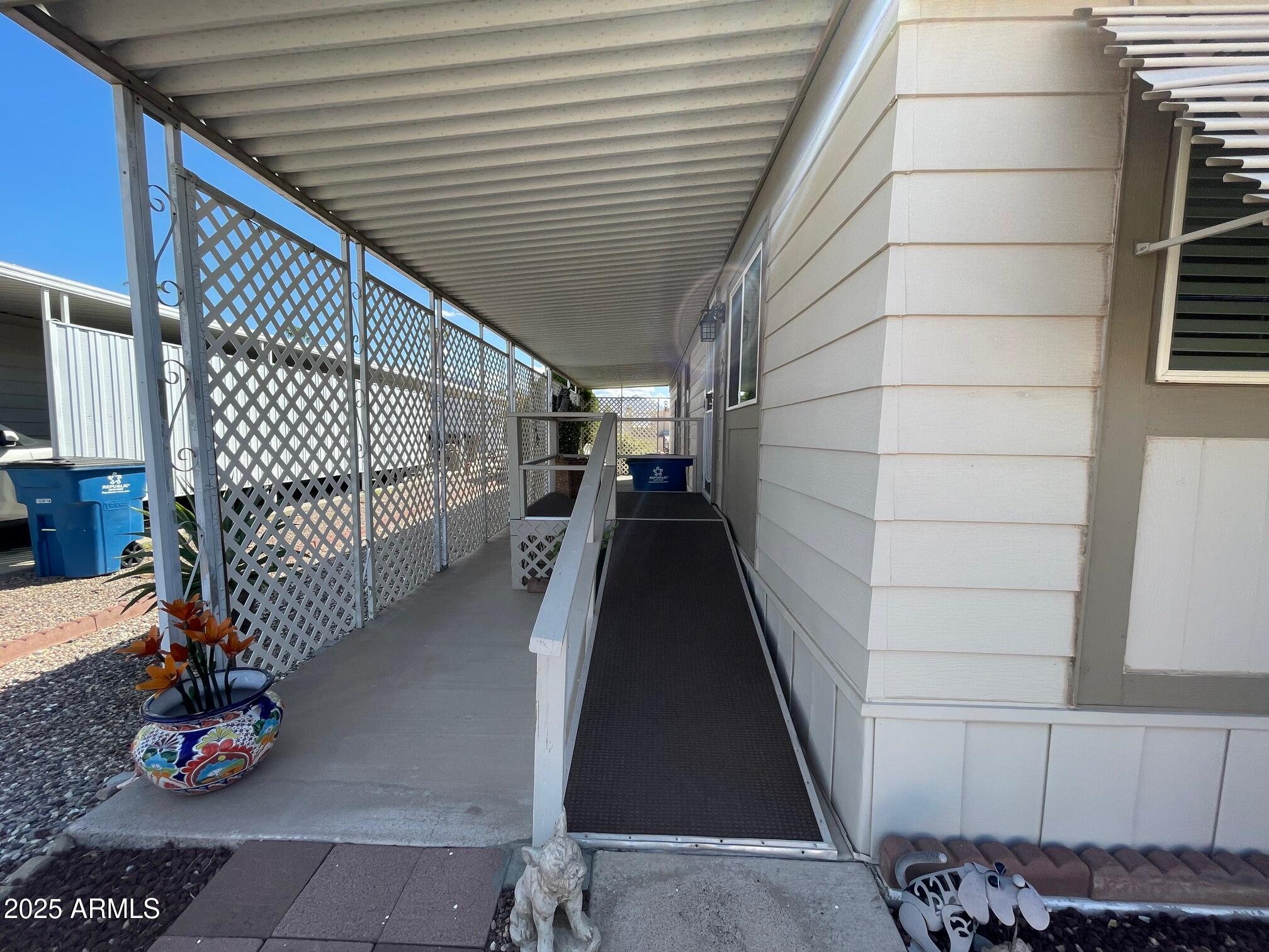 980 East Broadway Avenue, Unit 15 Apache Junction, AZ 85119 - Photo 6 of 24 a view of entryway with a rug