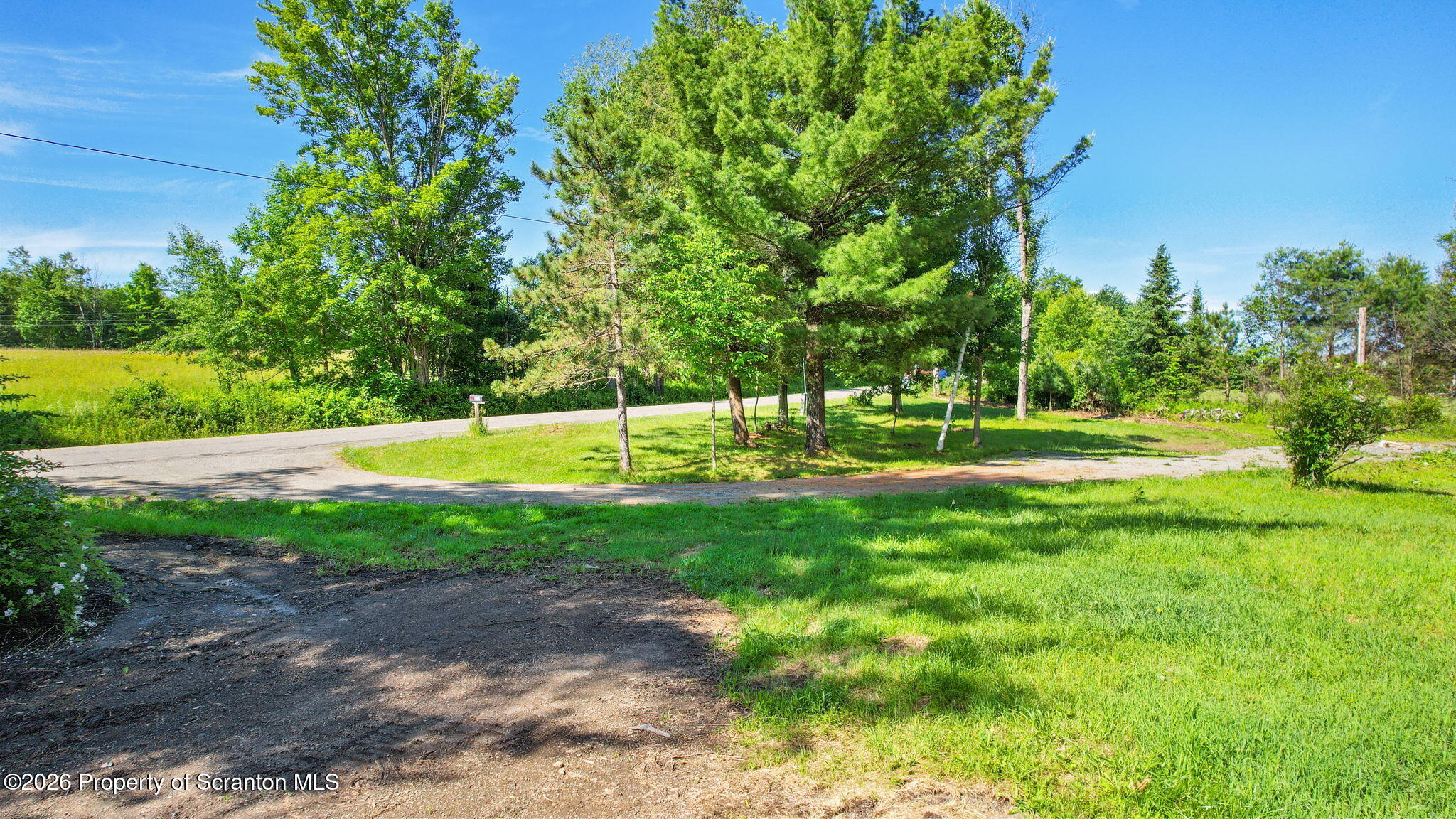 9015 Laurel Lake Road Montrose, PA 18801 - Photo 23 of 25 a view of a park with large trees