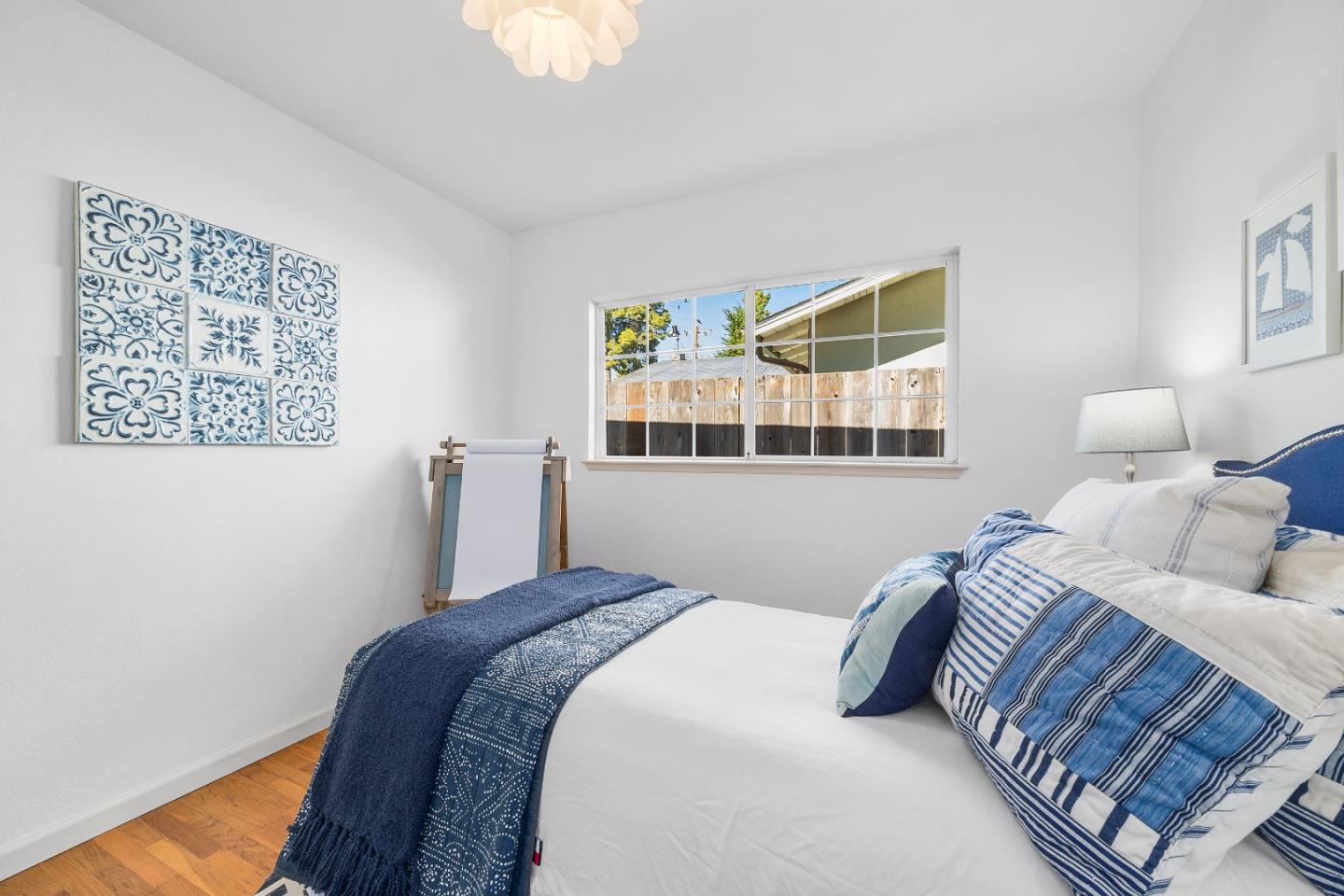 105 Wesley Street Capitola, CA 95010 - Photo 28 of 55 a bedroom with bed and a window
