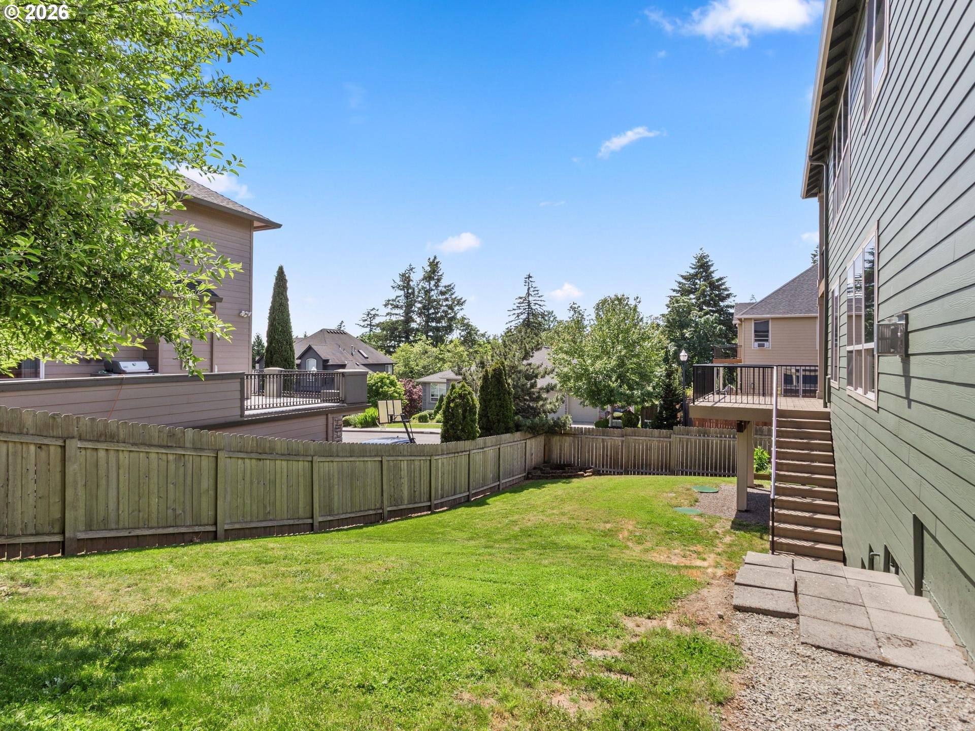 1012 Northwest Goodwin Street Camas, WA 98607 - Photo 35 of 44 a view of a backyard with a garden and plants